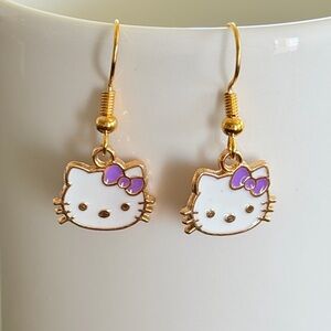 White Hello Kitty Face Hook Earrings with Purple Bows